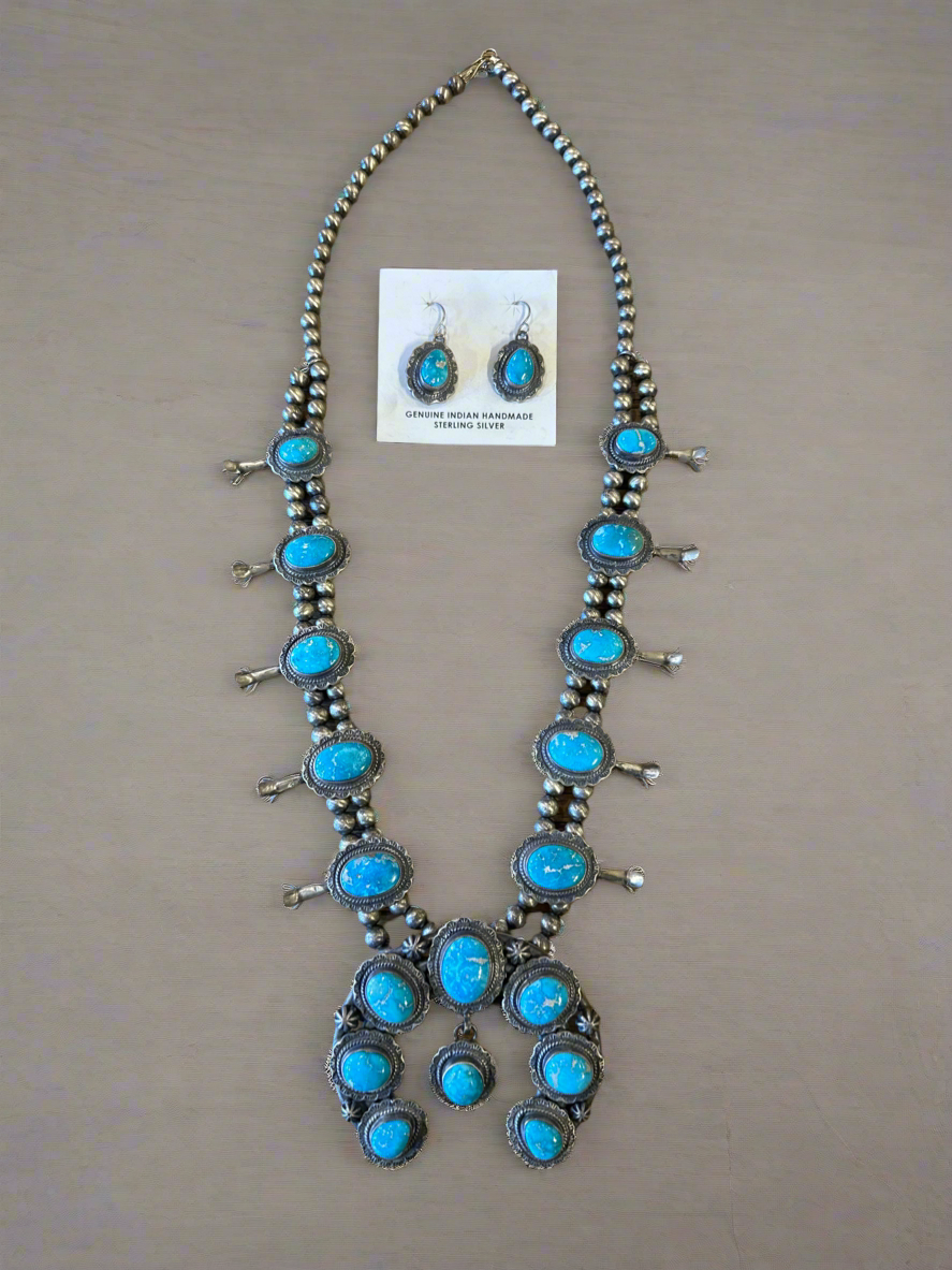 Turquoise squash blossom and earrings set made by Thomas Francisco.