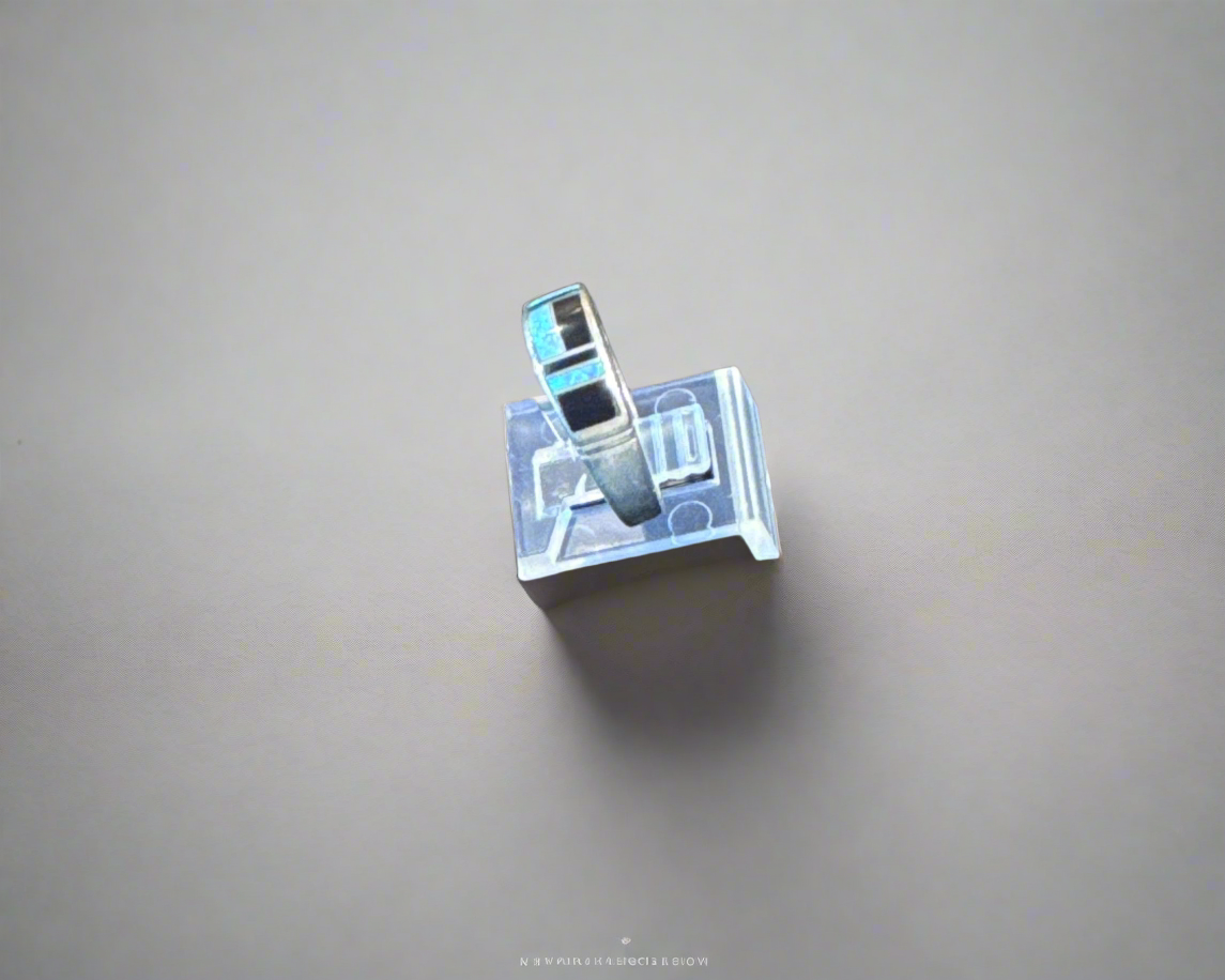 Black Jade ring by Super Smith With White Opal.