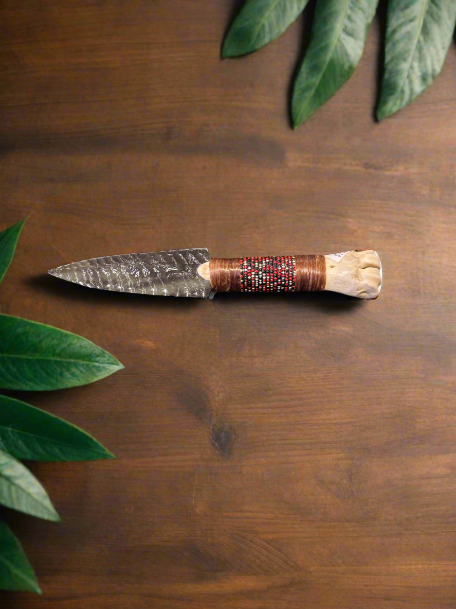 Small beaded bone obsidian knife.