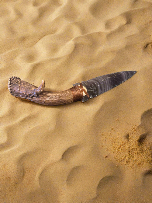 Antler handle obsidian knife with bear paw Carved In the hilt