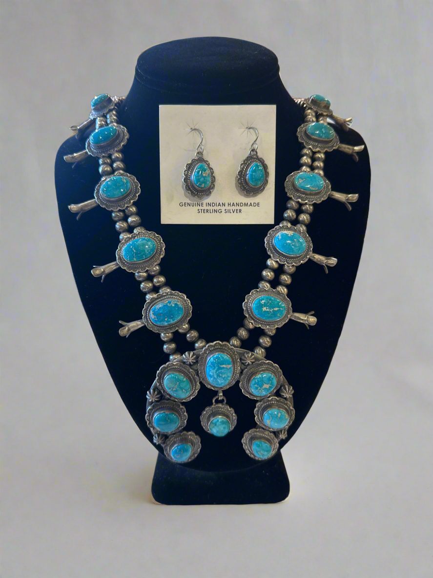 Turquoise squash blossom and earrings set made by Thomas Francisco.