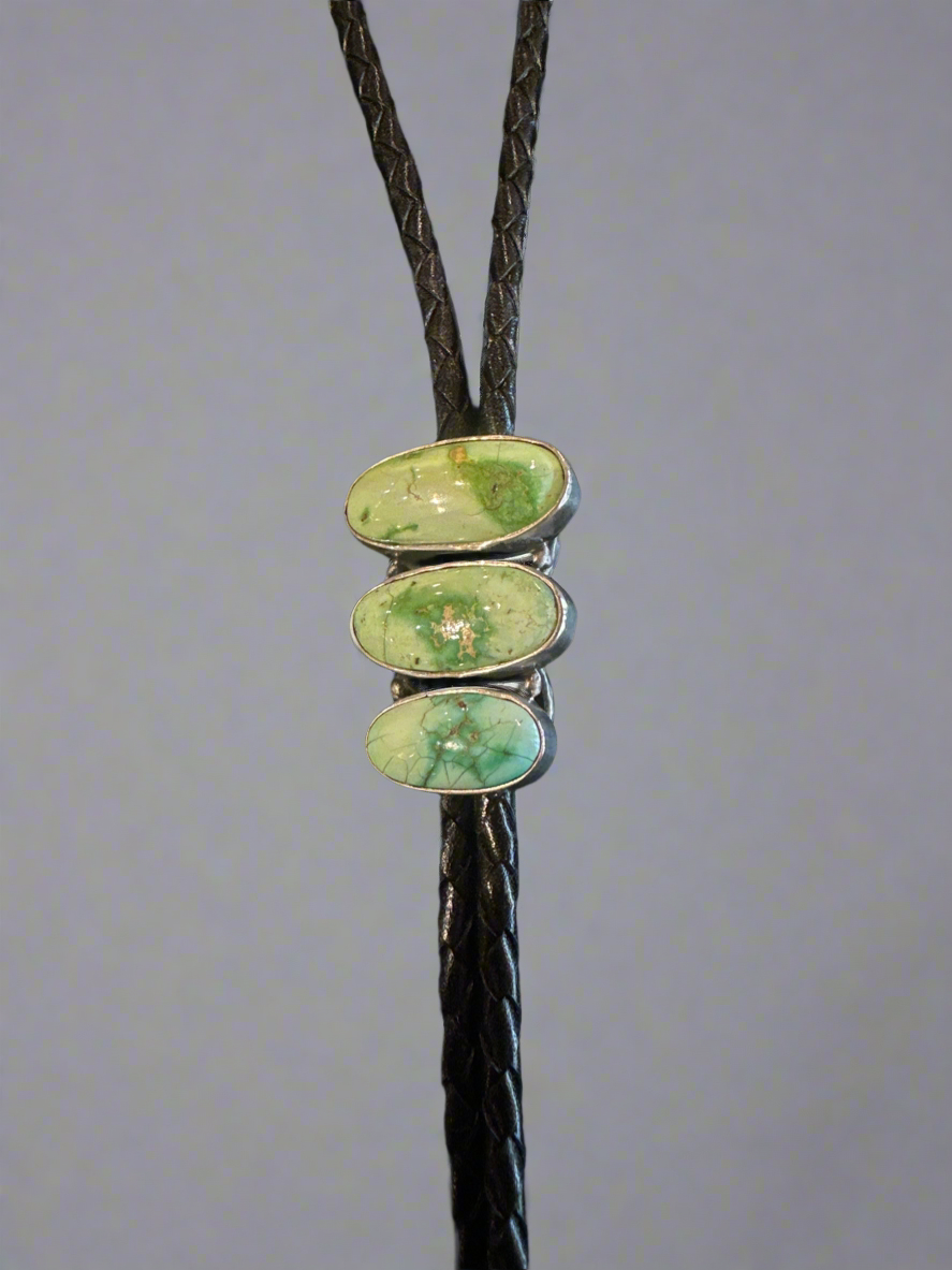 Handmade Native American Bolo-Tie with Green Turquoise Stones.