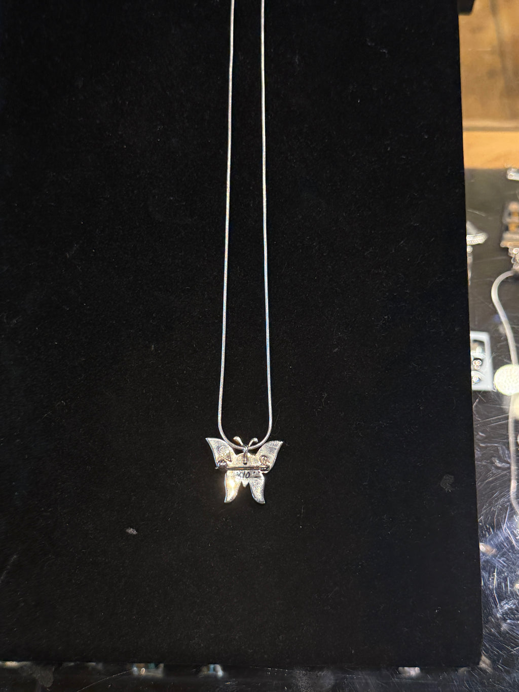 Butterfly pendent Native Earth.